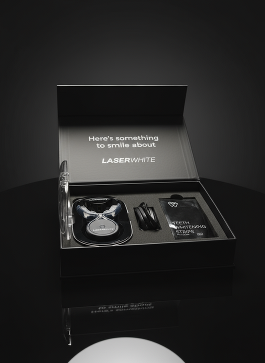 LaserWhite Kit box open with LED device and strips